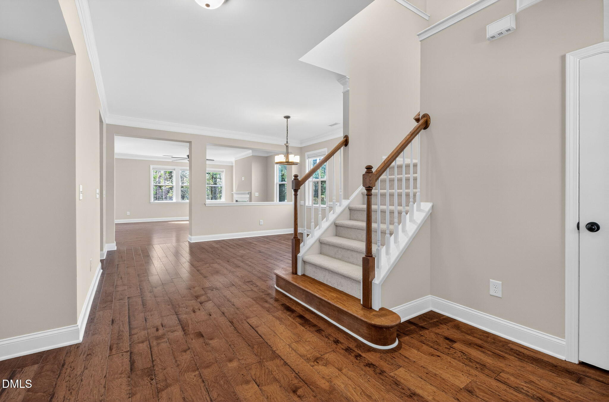 1304 Barnford Mill Road Wake Forest, NC 27587 - Photo 6 of 44 a view of entryway with wooden floor and stairs