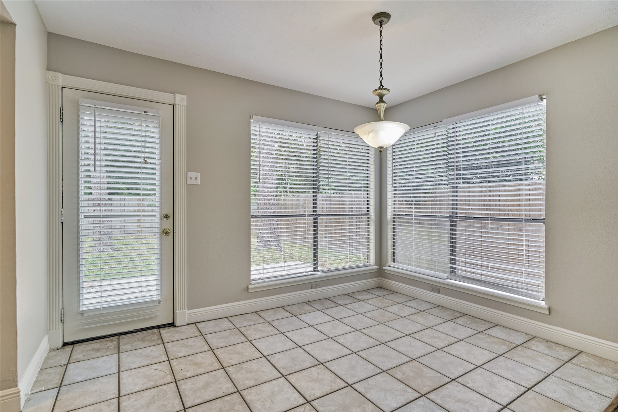 3 Field Flower Court Spring, TX 77380 - Photo 14 of 36 a view of an empty room with a window