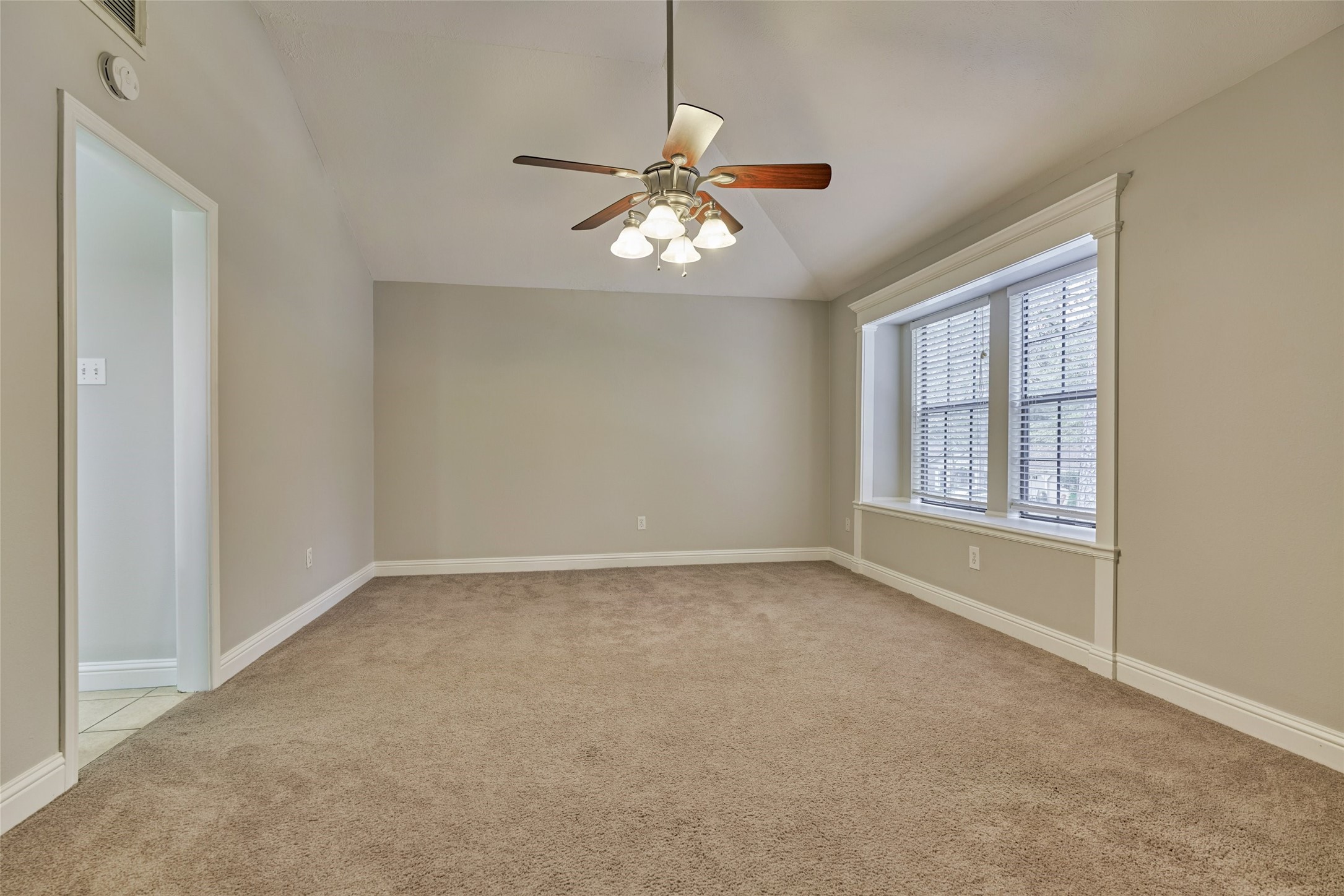 3 Field Flower Court Spring, TX 77380 - Photo 19 of 36 a view of an empty room with a window