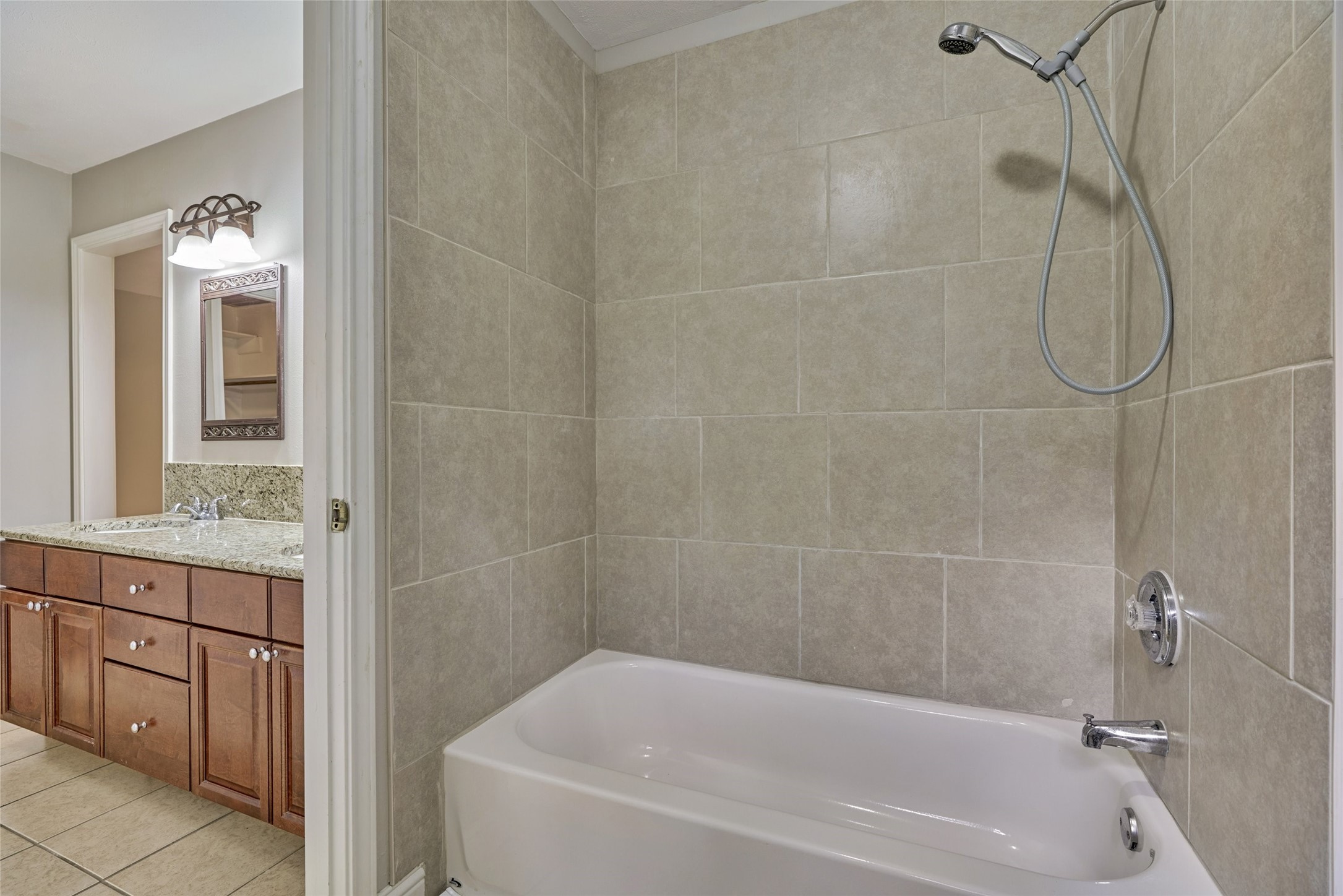 3 Field Flower Court Spring, TX 77380 - Photo 23 of 36 a bathroom with a sink a toilet and shower