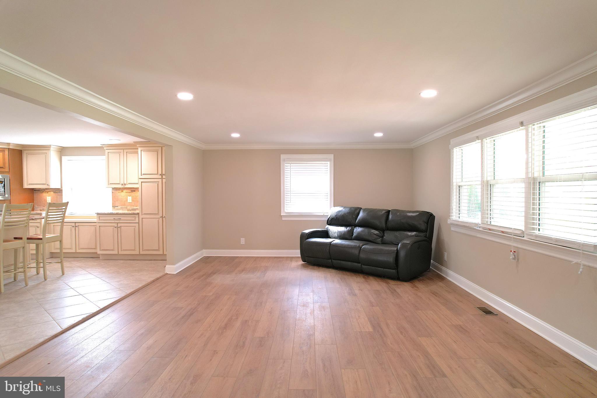 555 Fairview Road Glassboro, NJ 08028 - Photo 8 of 46 a living room with furniture and wooden floor