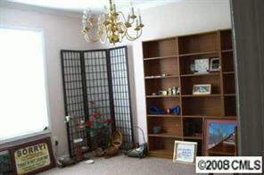 5123 Cheviot Road Charlotte, NC 28269 - Photo 4 of 7 a view of a hallway with cabinet