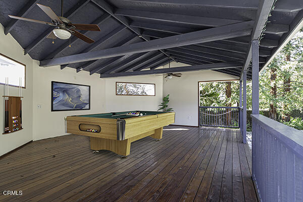 3850 Shadow Grove Road Pasadena, CA 91107 - Photo 15 of 16 a room with wooden floors and couch