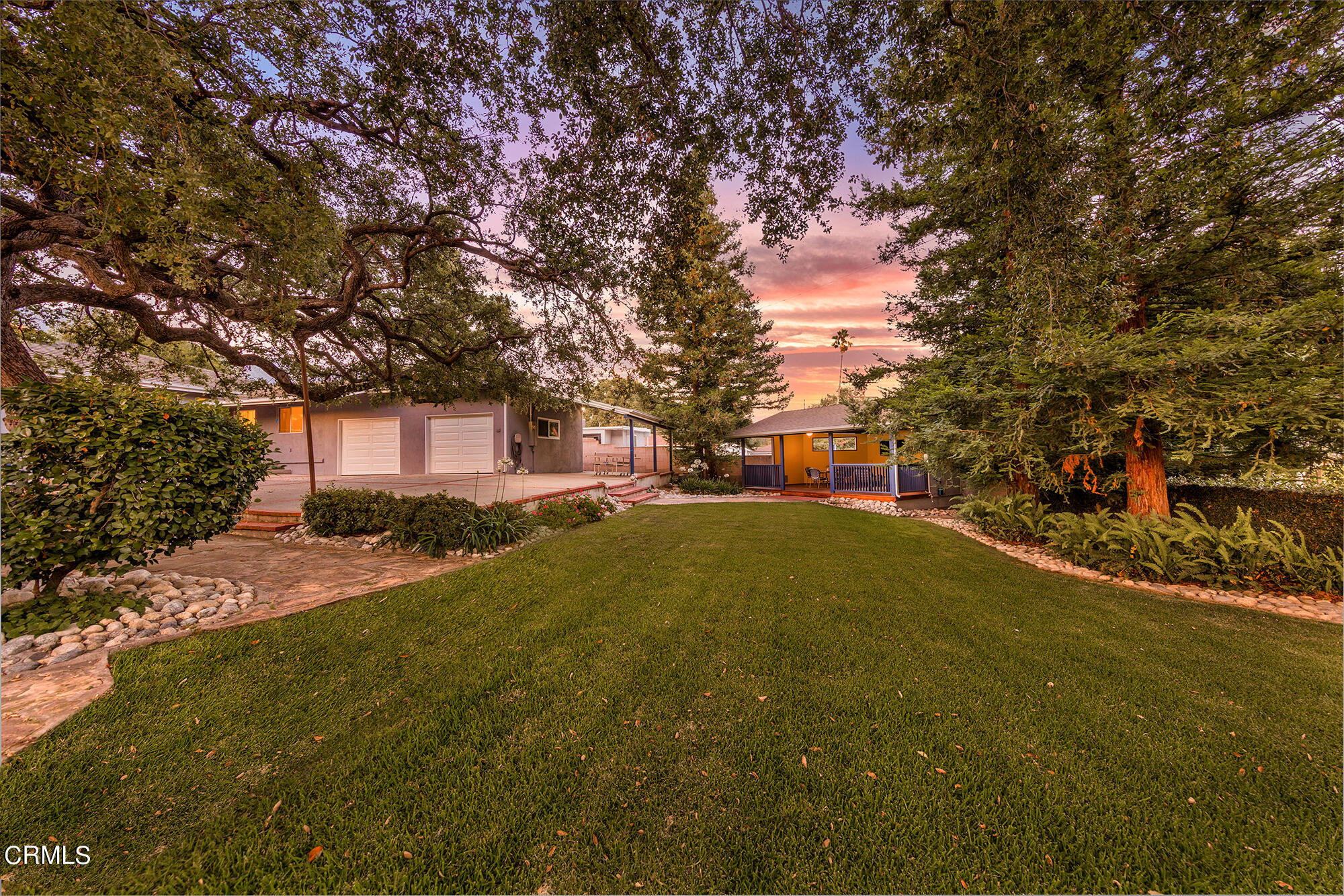 3850 Shadow Grove Road Pasadena, CA 91107 - Photo 16 of 16 a front view of a house with a yard and garage