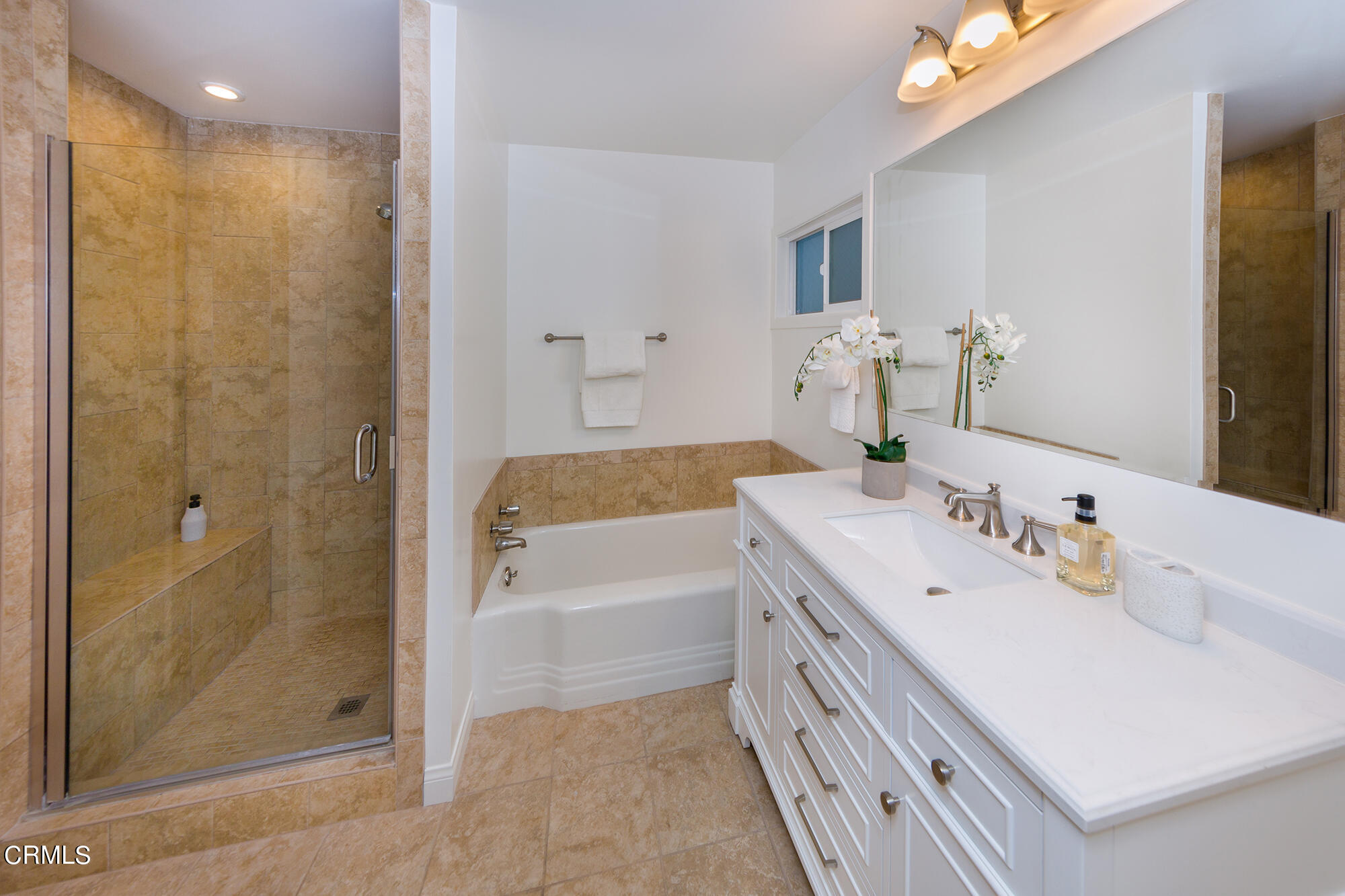 3850 Shadow Grove Road Pasadena, CA 91107 - Photo 7 of 16 a bathroom with a bathtub a sink and a mirror