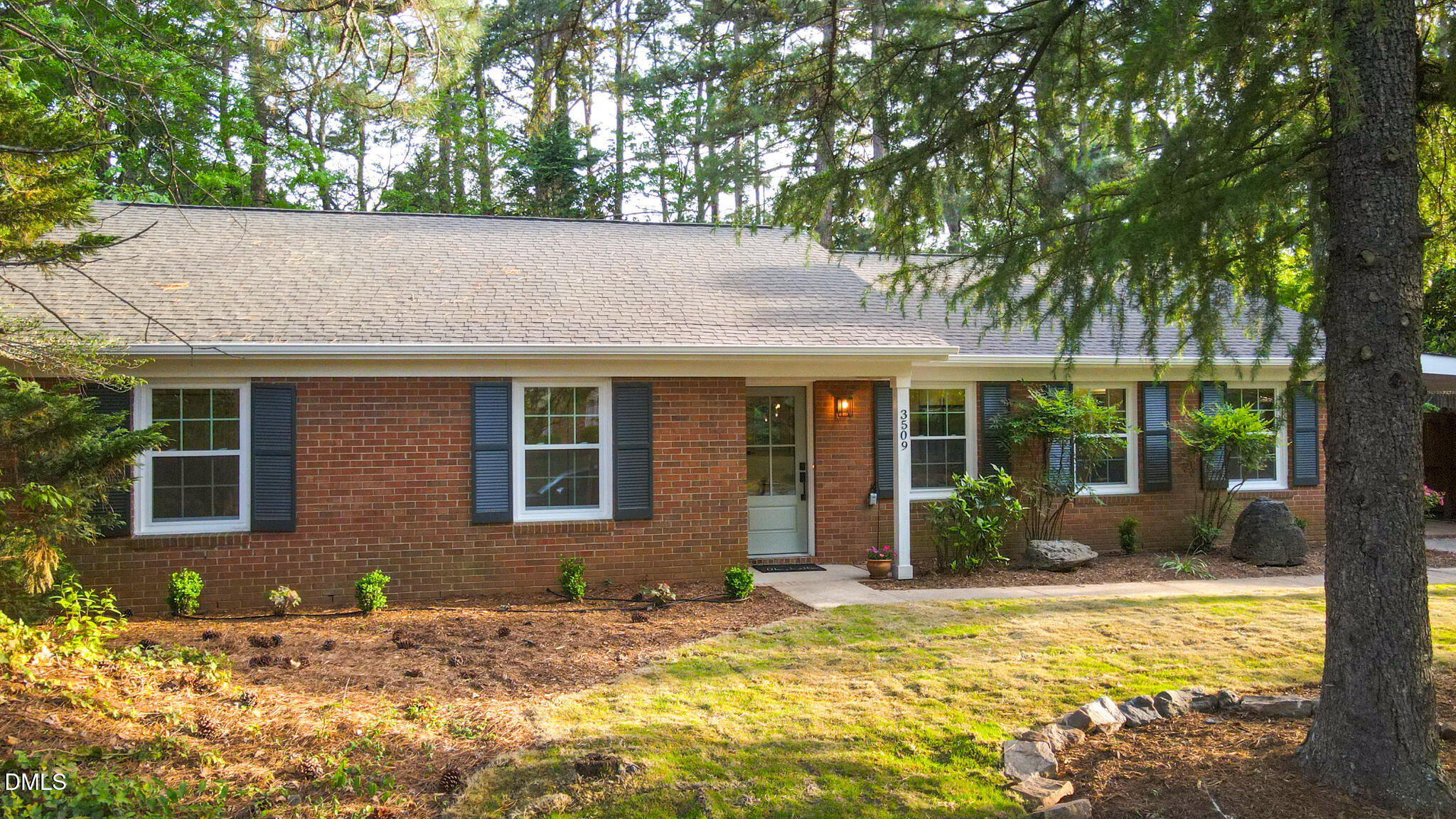 3509 Morningside Drive Raleigh, NC 27607 - Photo 38 of 49 a front view of a house with garden