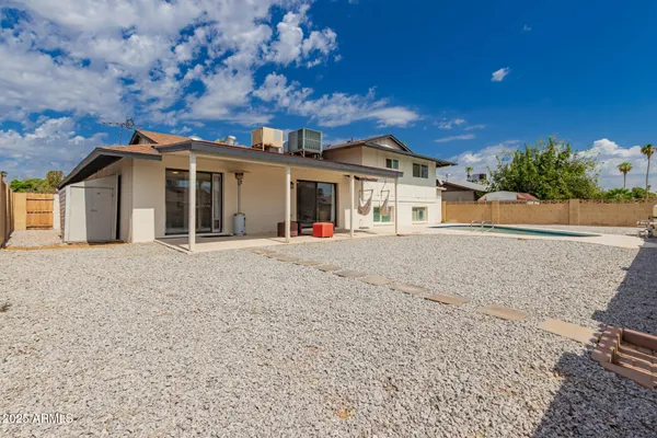 front view of a house with a road
