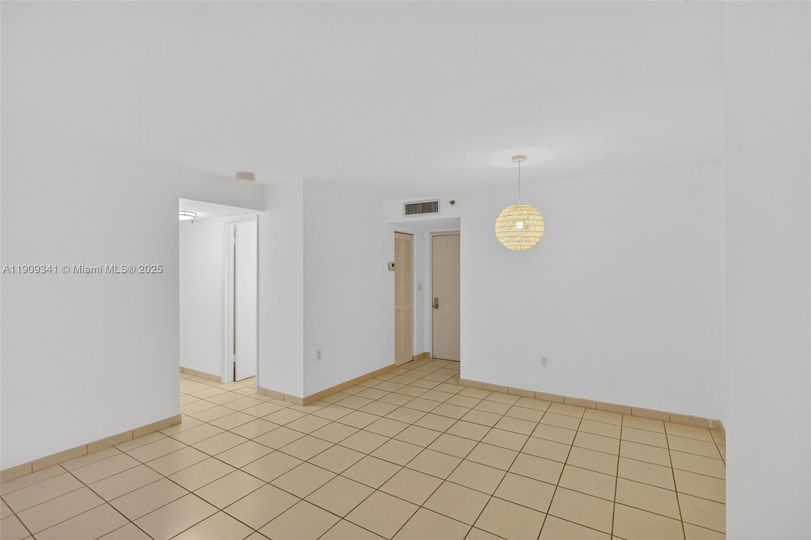 6061 Collins Avenue, Unit 7B Miami Beach, FL 33140 - Photo 13 of 41 a view of an empty room