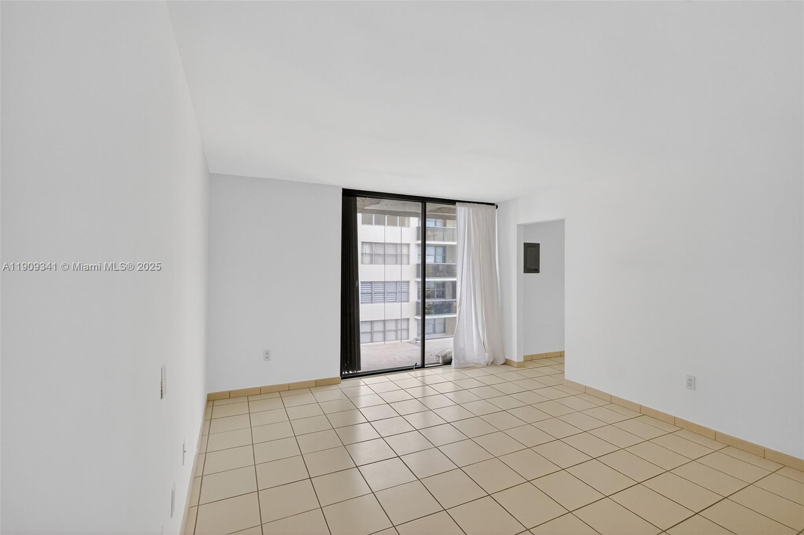6061 Collins Avenue, Unit 7B Miami Beach, FL 33140 - Photo 16 of 41 a view of an empty room