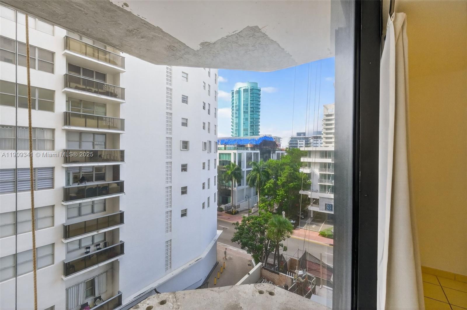 6061 Collins Avenue, Unit 7B Miami Beach, FL 33140 - Photo 33 of 41 a view of balcony with potted plants