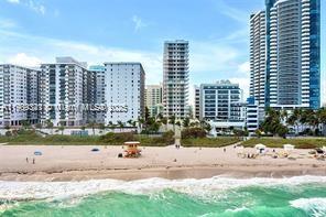 6061 Collins Avenue, Unit 7B Miami Beach, FL 33140 - Photo 41 of 41 a view of a city with tall buildings