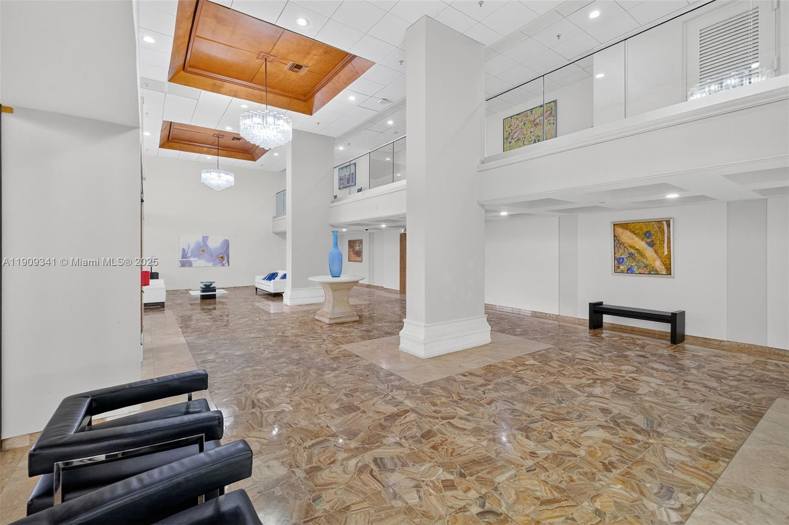 6061 Collins Avenue, Unit 7B Miami Beach, FL 33140 - Photo 6 of 41 a living room with furniture