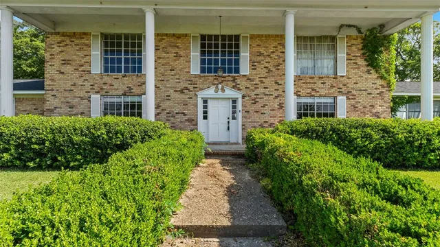 front view of house with a yard