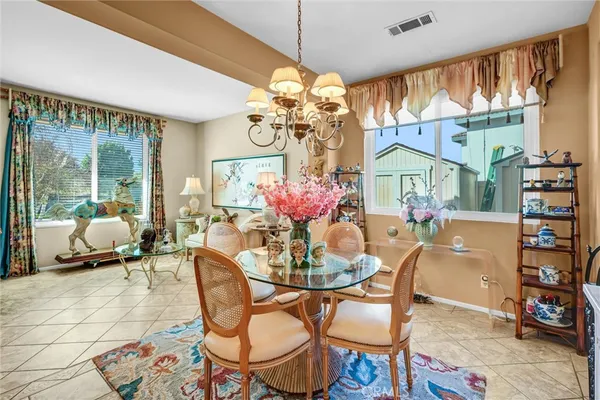 a bathroom with a sink mirror vanity and toilet