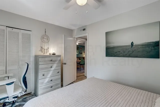 a bedroom with a bed and furniture