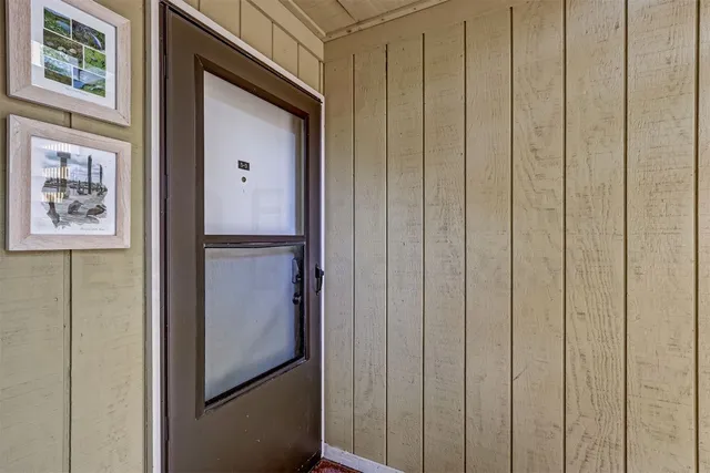 a view of elevator with hallway