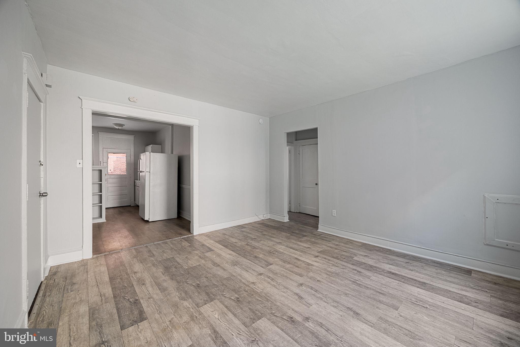 7250 Chestnut Street, Unit E101 Upper Darby, PA 19082 - Photo 9 of 18 a view of an empty room and window