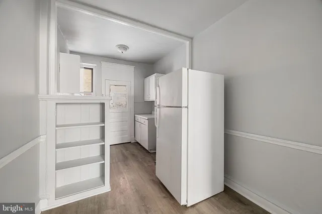 a kitchen that has a sink and a stove