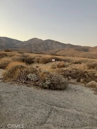 a view of lake with mountain