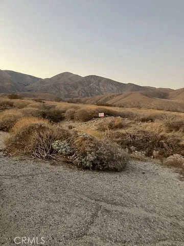 a view of lake with mountain