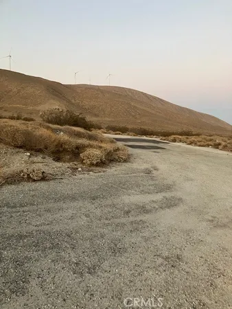 a view of an ocean and mountain