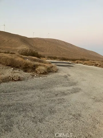 a view of an ocean and mountain