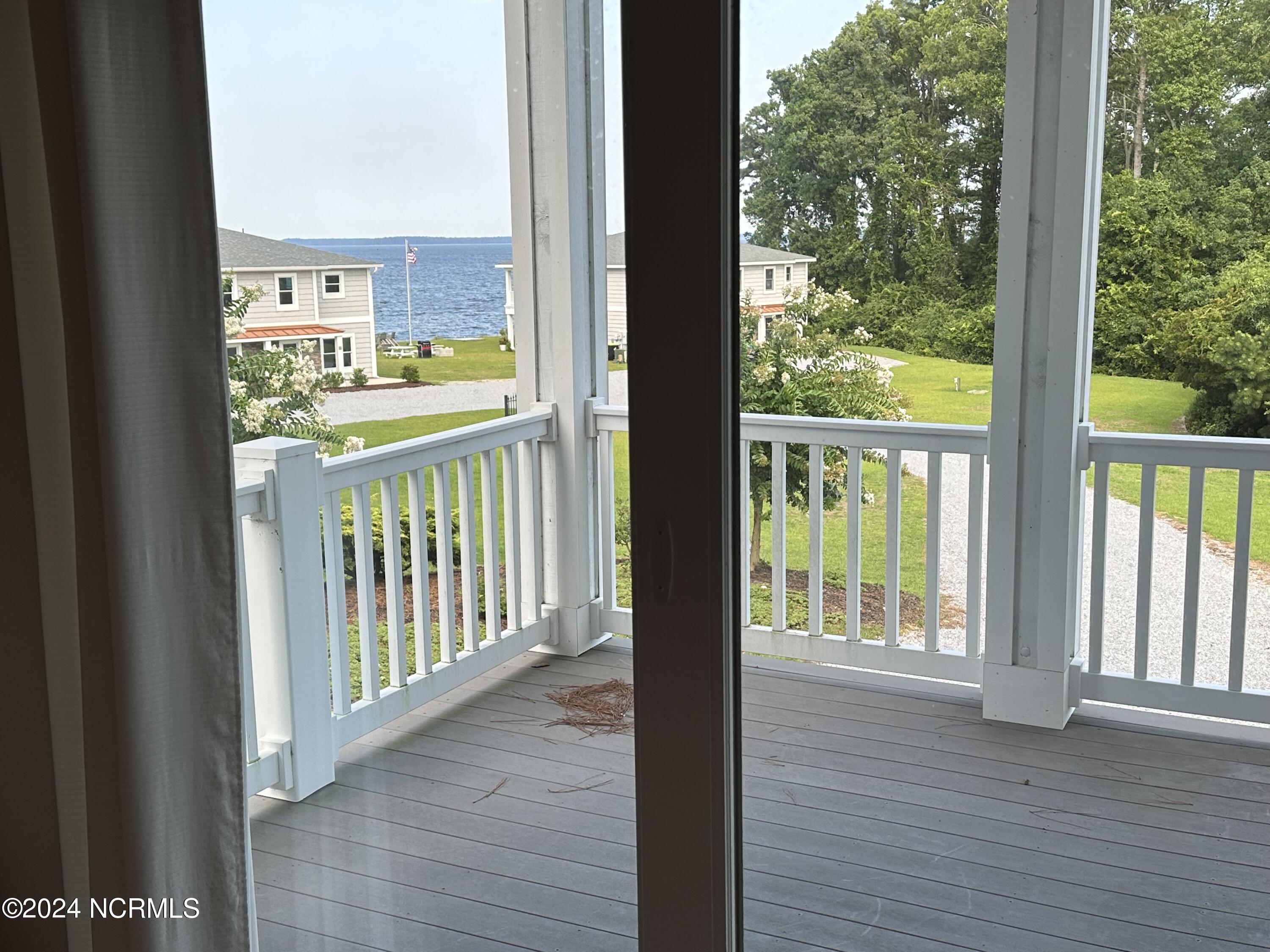 1129 Bennett Road, Unit 1A Minnesott Beach, NC 28510 - Photo 19 of 35 What's not to love about this view from the primary bedroom.