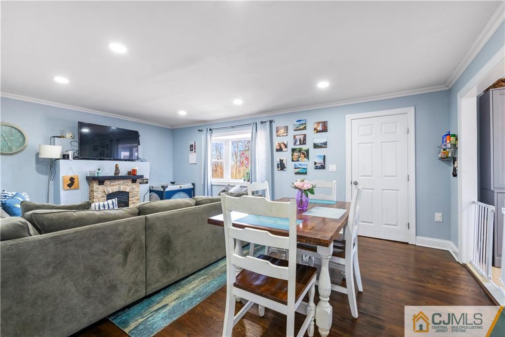 57 Dunhams Corner Road East Brunswick, NJ 08816 - Photo 14 of 31 a living room with furniture and a wooden floor