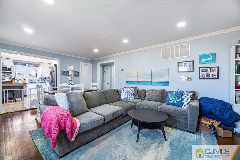 57 Dunhams Corner Road East Brunswick, NJ 08816 - Photo 21 of 31 a living room with furniture and a couch