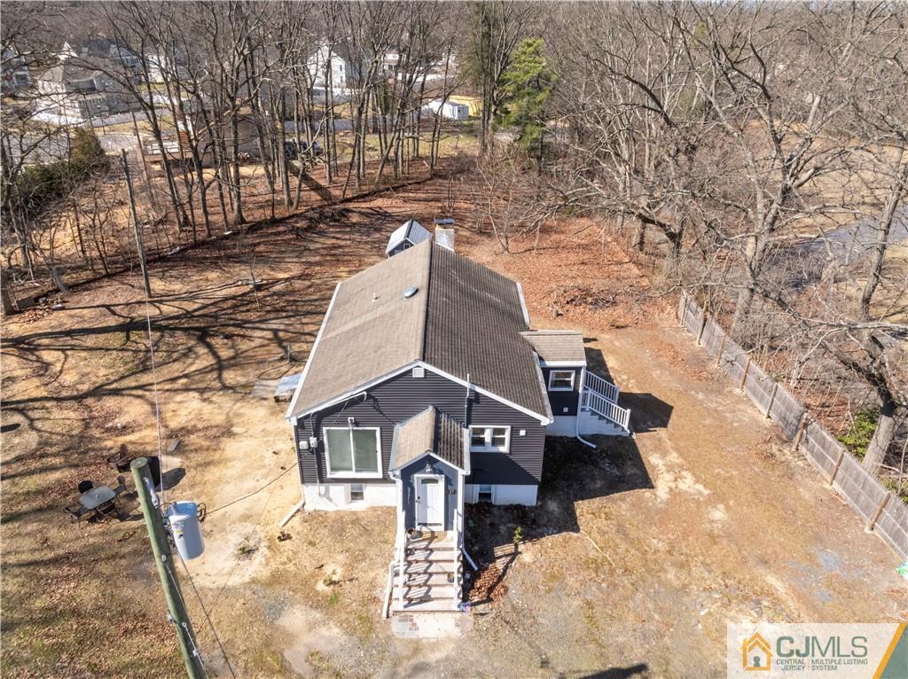 57 Dunhams Corner Road East Brunswick, NJ 08816 - Photo 4 of 31 a view of a house with a yard