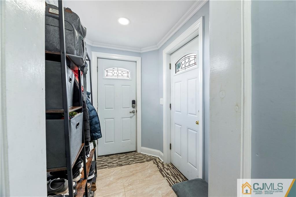 57 Dunhams Corner Road East Brunswick, NJ 08816 - Photo 8 of 31 a view of a hallway with closet