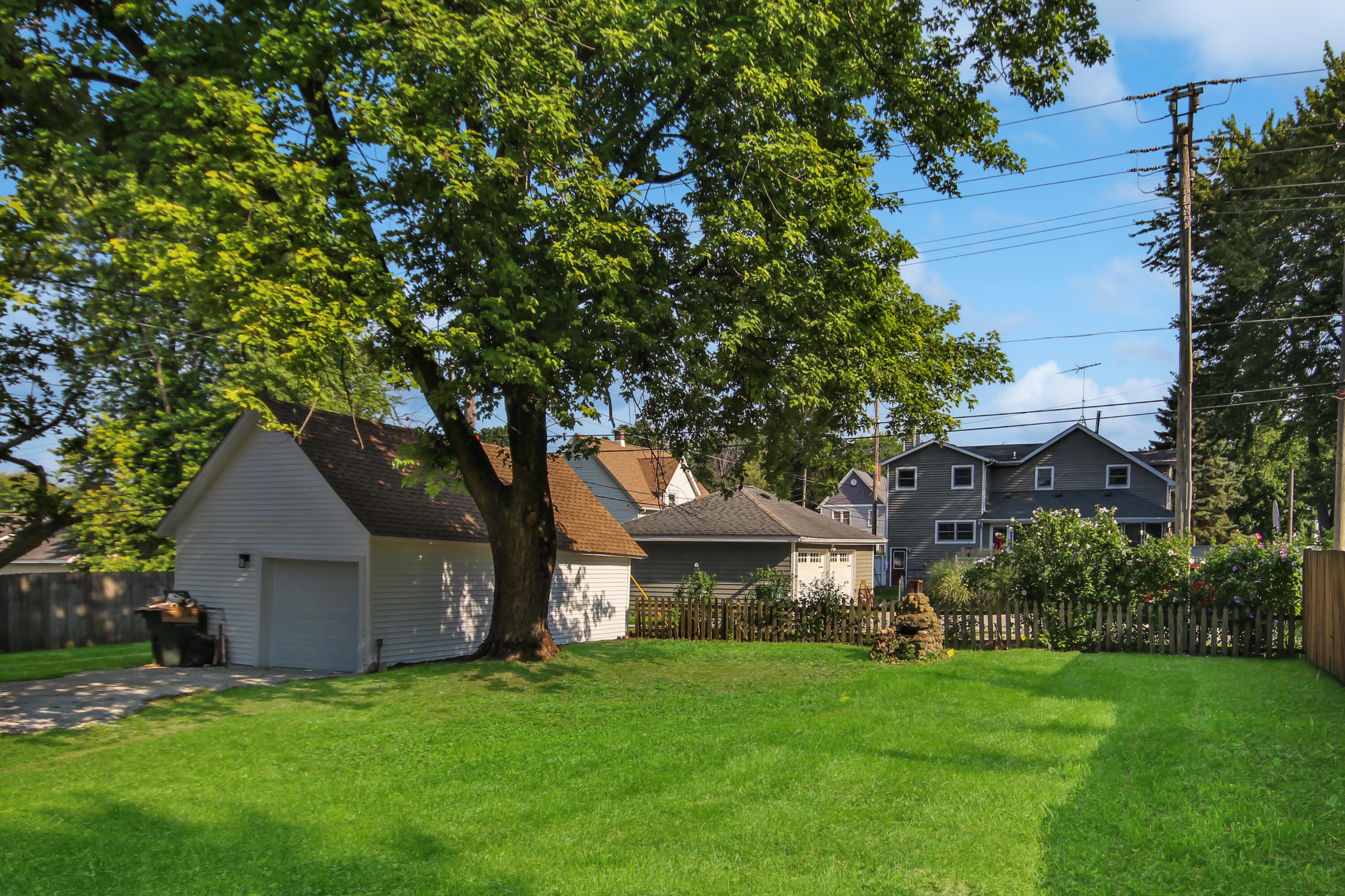 405 Institute Street Valparaiso, IN 46383 - Photo 17 of 17 a view of a big yard next to a house