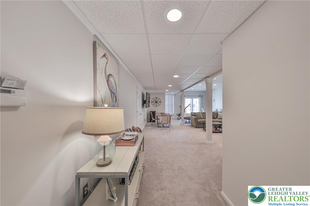 163 Muirfield Way Easton, PA 18042 - Photo 35 of 48 a very nice looking room with a chair