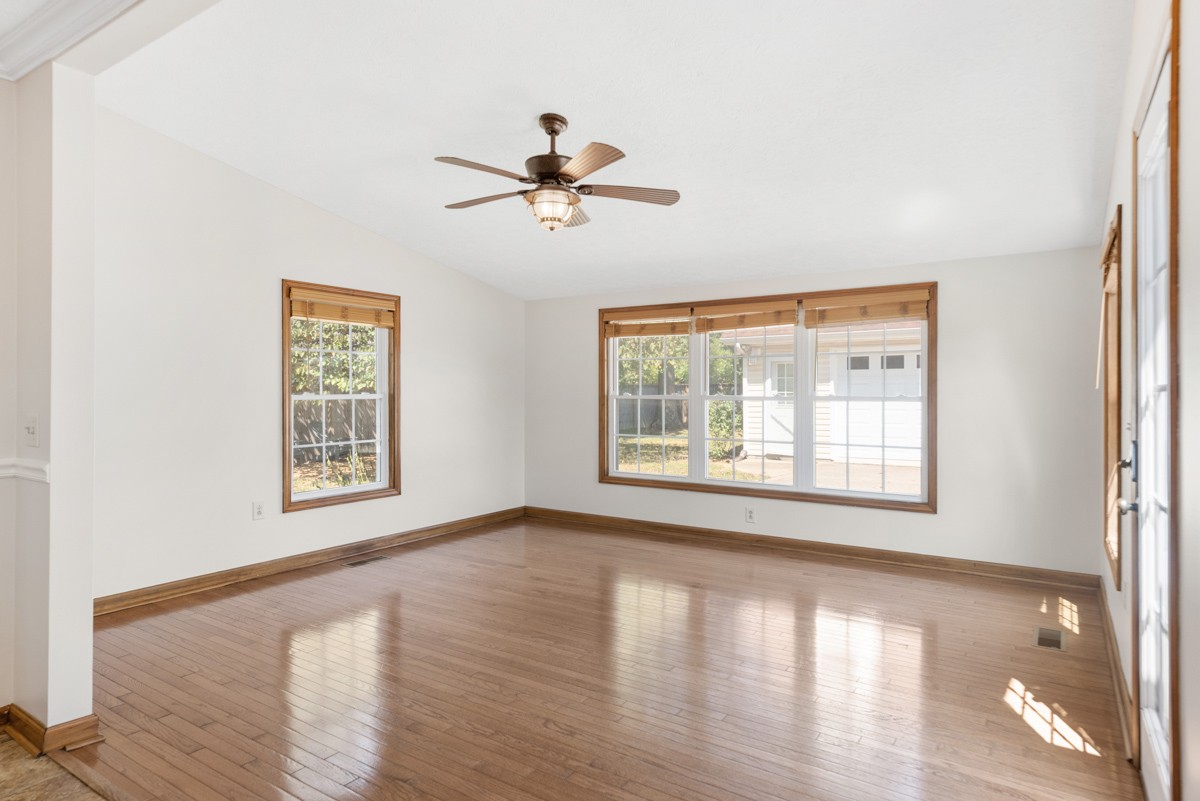 526 Calista Road White House, TN 37188 - Photo 11 of 29 a view of an empty room with a window and wooden floor