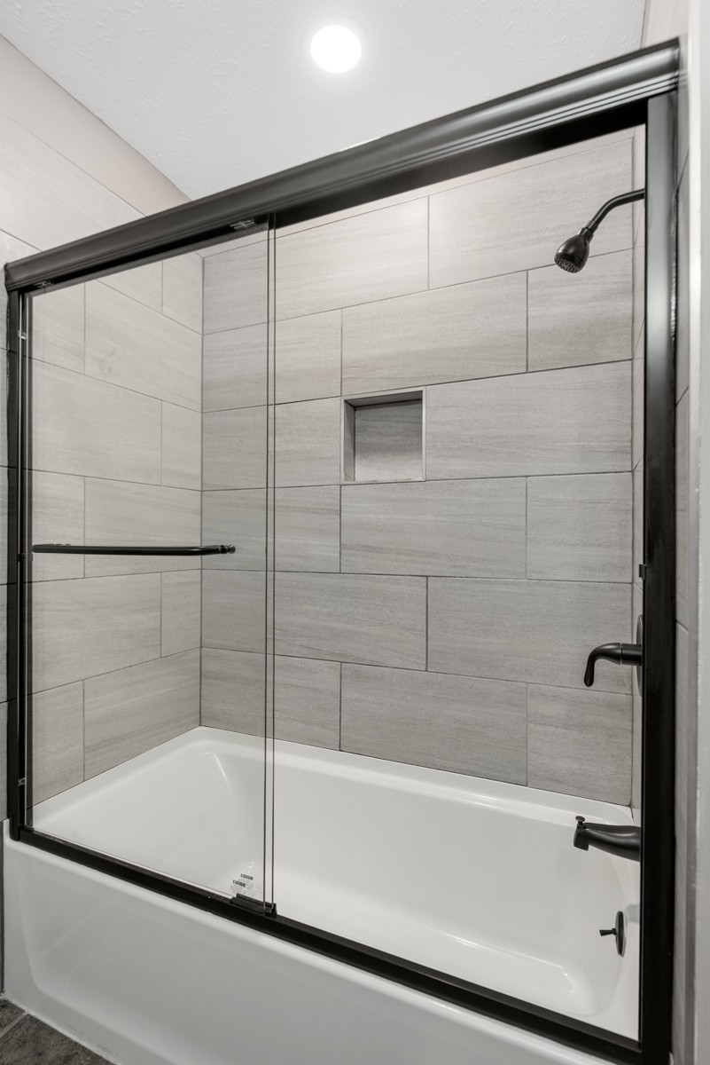 526 Calista Road White House, TN 37188 - Photo 19 of 29 a bathroom with a bathtub and a shower