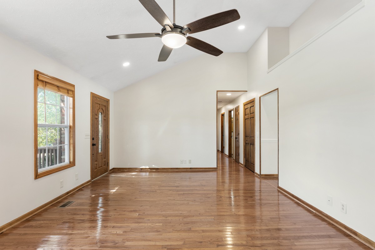 526 Calista Road White House, TN 37188 - Photo 5 of 29 a view of an empty room with window and wooden floor