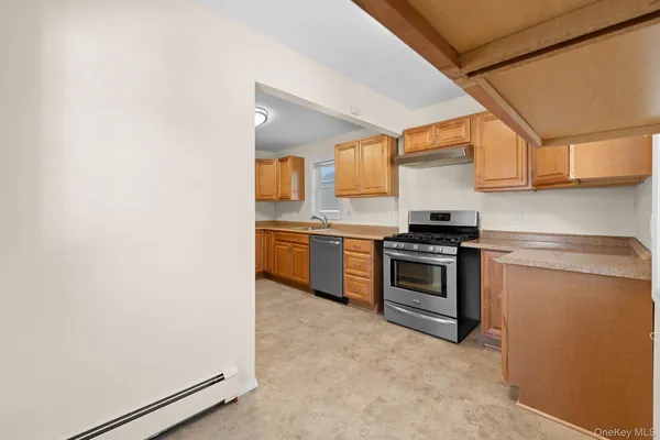 a kitchen with a stove and a microwave