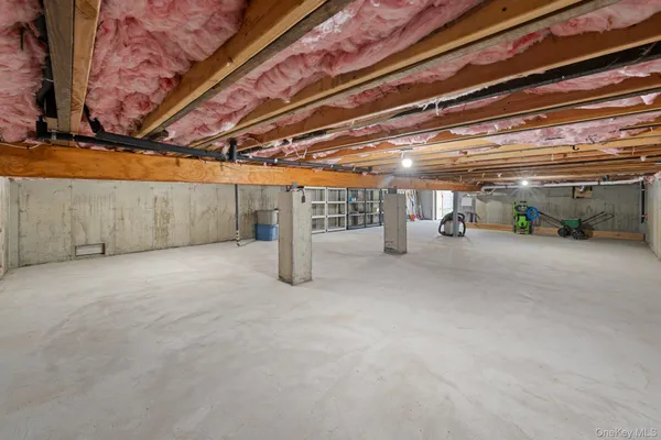 a view of a empty room with storage