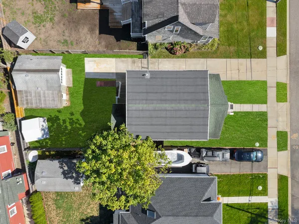 an aerial view of a house with a garden