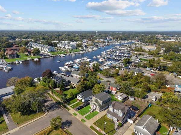 an aerial view of a city with lots of residential buildings