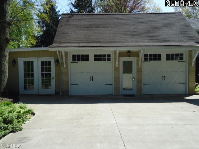 924 Raff Road Southwest Canton, OH 44710 - Photo 24 of 25 A studio and 2 car garage with additional storage space. Heated and more! Gated home with generous off-road parking.