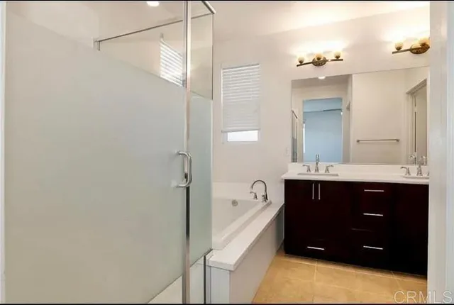 a kitchen with a sink and a microwave