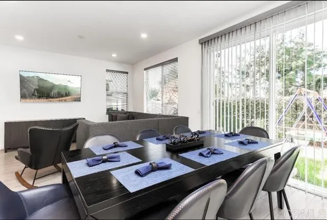 a bathroom with a sink a mirror and a shower