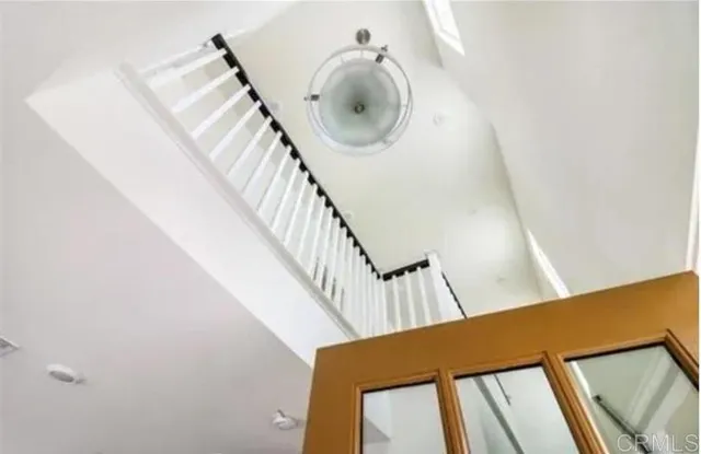 a bedroom with bed and a window