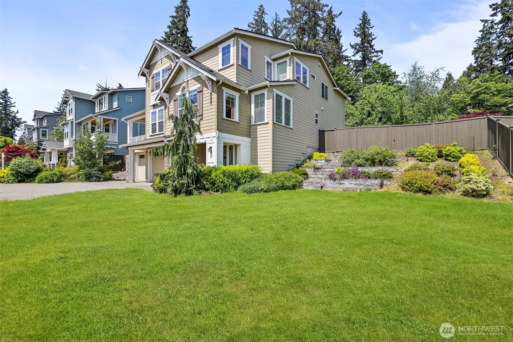 29 242nd Street Southeast Bothell, WA 98021 - Photo 36 of 40 a front view of a house with a garden