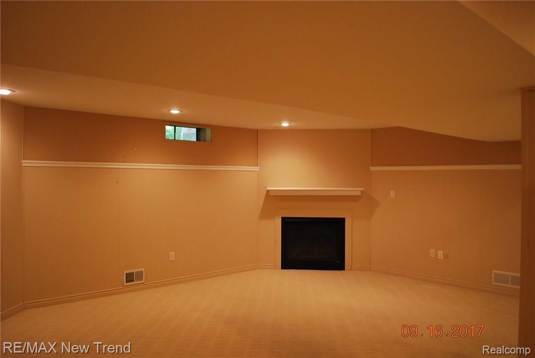 21680 River Ridge Trail, Unit 197 Farmington, MI 48335 - Photo 10 of 17 FAMILY ROOM LOWER LEVEL