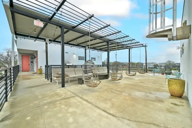 a view of a swimming pool with a patio