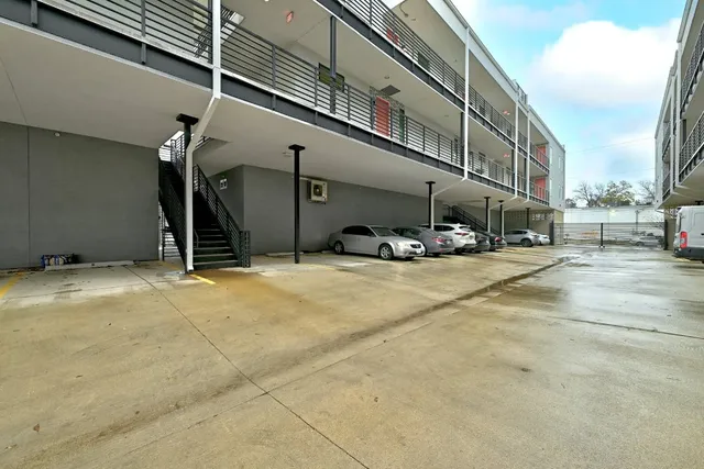a view of street with large building