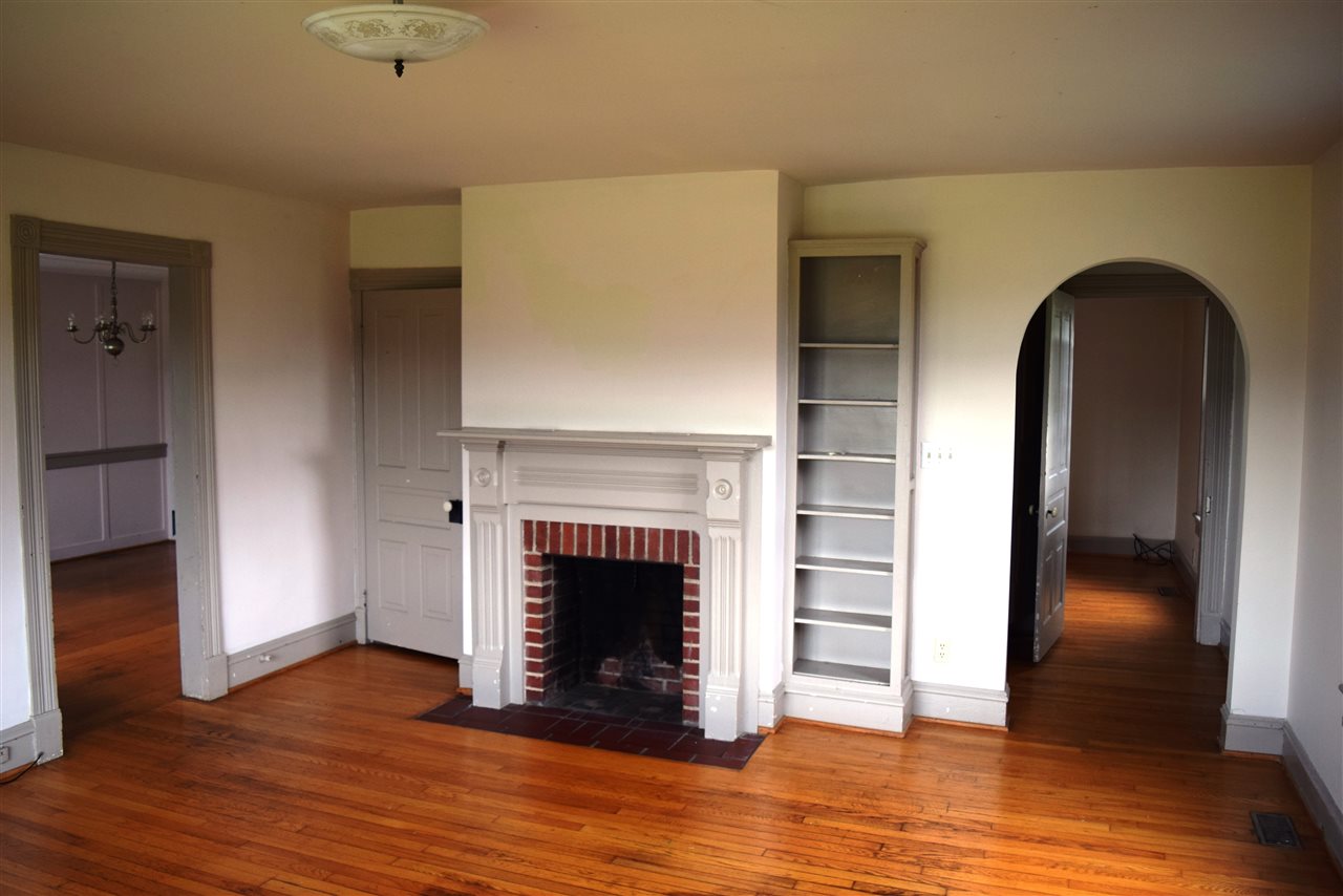 1800 Duke Road Waynesboro, VA 22980 - Photo 19 of 41 a view of a livingroom with wooden floor and a fireplace