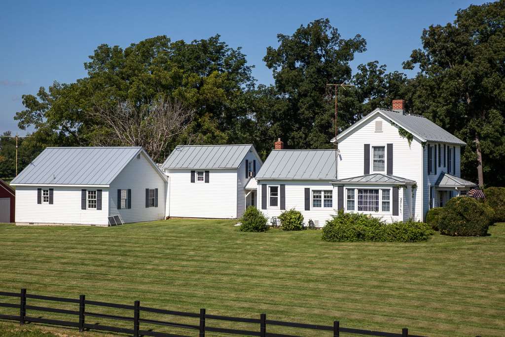 1800 Duke Road Waynesboro, VA 22980 - Photo 2 of 41 a front view of a house with a garden